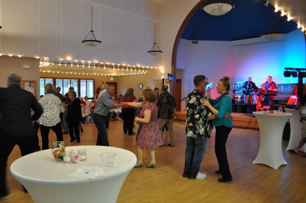 People Dancing and Band Playing in Hall