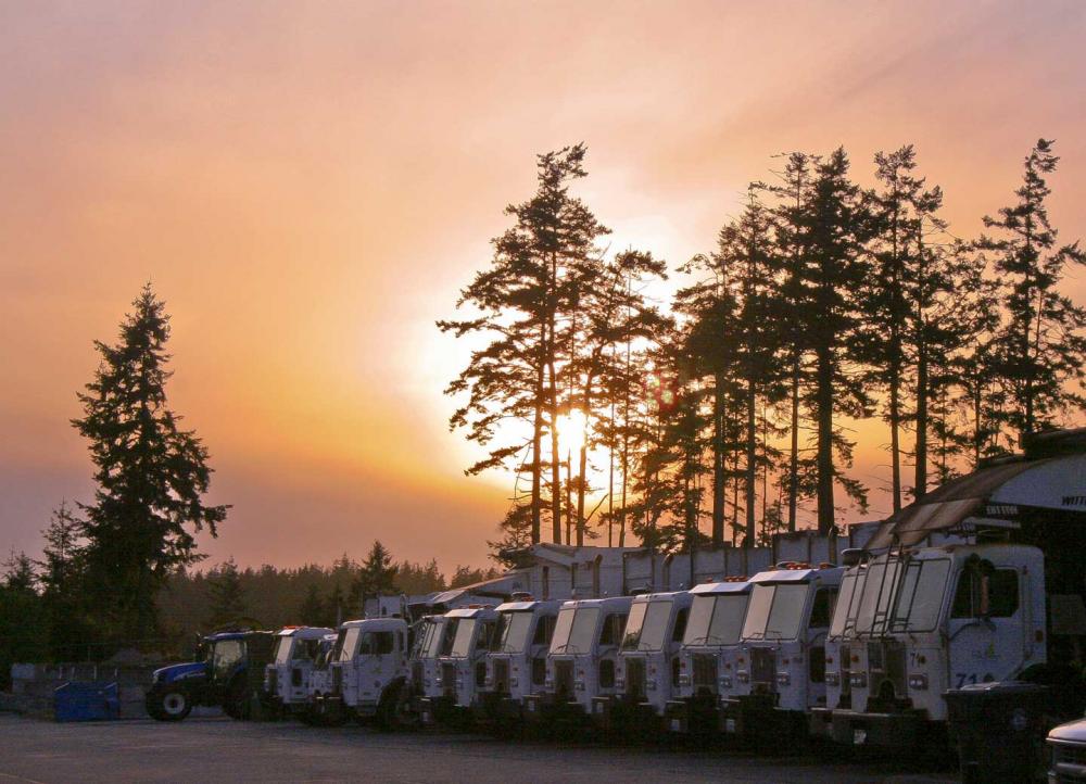Solid Waste Vehicles and Sunset